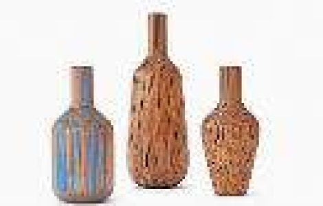 Nu vei ghici niciodata din ce au fost facute aceste vase de flori