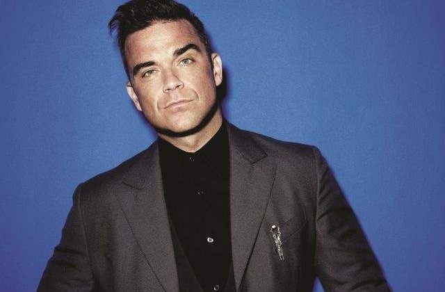 Robbie Williams si-a vandut peste 150 de obiecte personale la o licitatie caritabila