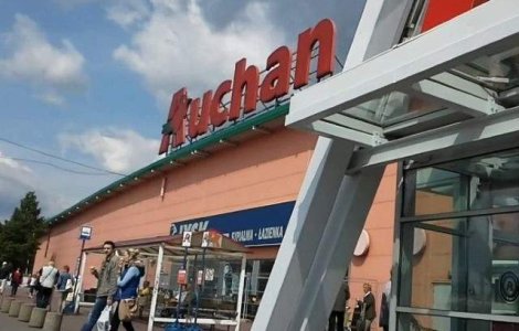 Auchan Titan, cumparat cu tot cu datorii de NEPI
