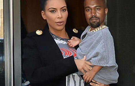 Funny: Cineva a photoshopat capul lui Kanye pe corpul lui North West