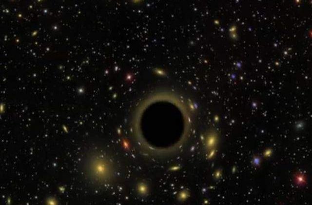 Premiera: O coliziune intre doua gauri negre va putea fi observata de cercetatori