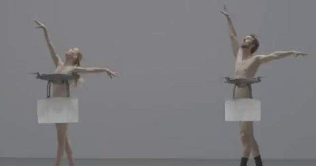 Danseaza goi pe scena in timp ce 4 drone le acopera partile intime