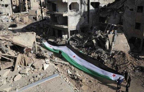 Opozitia siriana a decis sa participe la negocierile de la Geneva