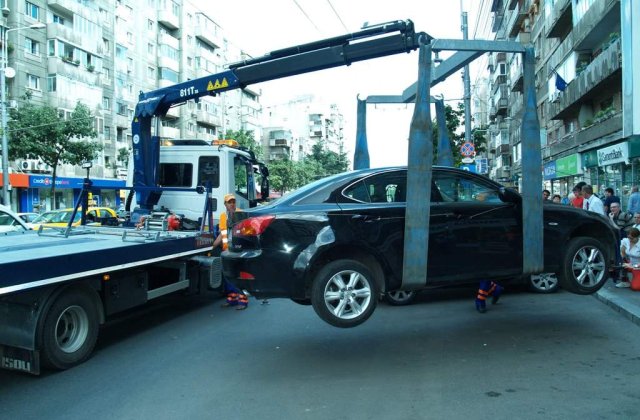 Masinile parcate neregulamentar vor putea fi ridicate de autoritati din nou