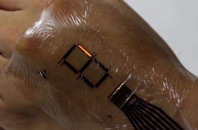 [Video] A fost inventat dispozitivul care transforma corpul uman intr-un ecran LED mobil