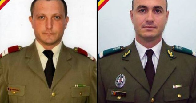 Romanii omorati in Afganistan, impuscati de indivizi in uniforme