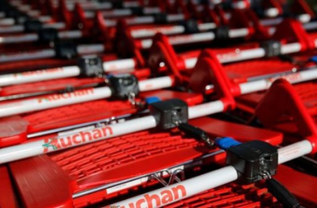 Perchezitii la proprietatile familiei ce detine Auchan si Decathlon