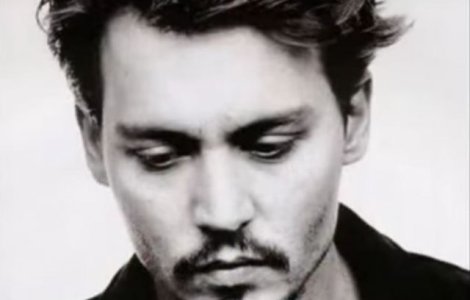 Johnny Depp s-a simtit "in elementul sau" la concertul pe care l-a sustinut in Bucuresti