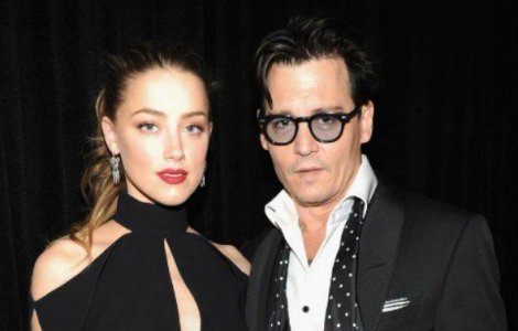 Divort: Actorii Johnny Depp si Amber Heard au ajuns la o intelegere