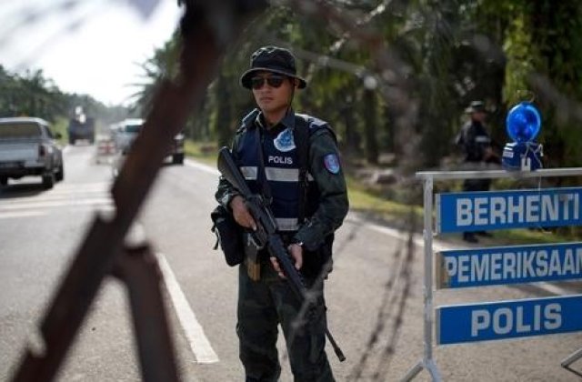 Malaezia, in alerta de teama unui reintoarceri in tara a militantilor SI dupa ofensiva asupra Mosulului