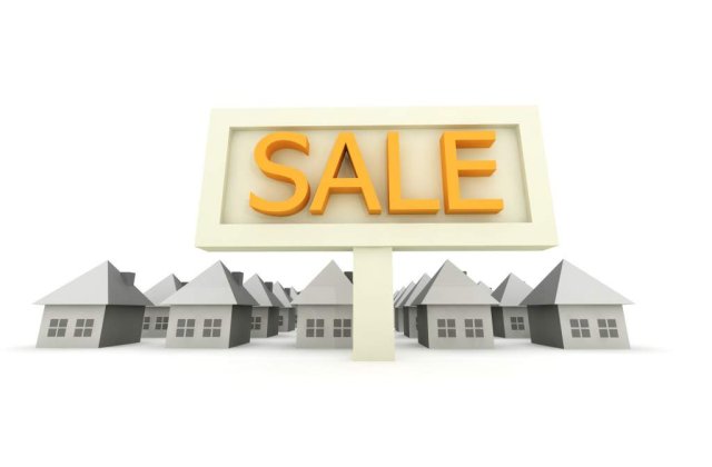 Un director de banca, suspectat de inselaciuni imobiliare