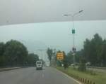 Dealurile Margala, Islamabad, Pakistan, abia sunt vizibile din cauza poluării